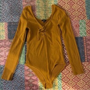 Mustard Ribbed Lace-Up Long Sleeve Bodysuit
